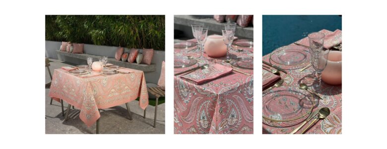 Table extérieure dressée avec nappe Darjeeling pêche Beauvillé, verres transparents et ambiance terrasse ensoleillée.